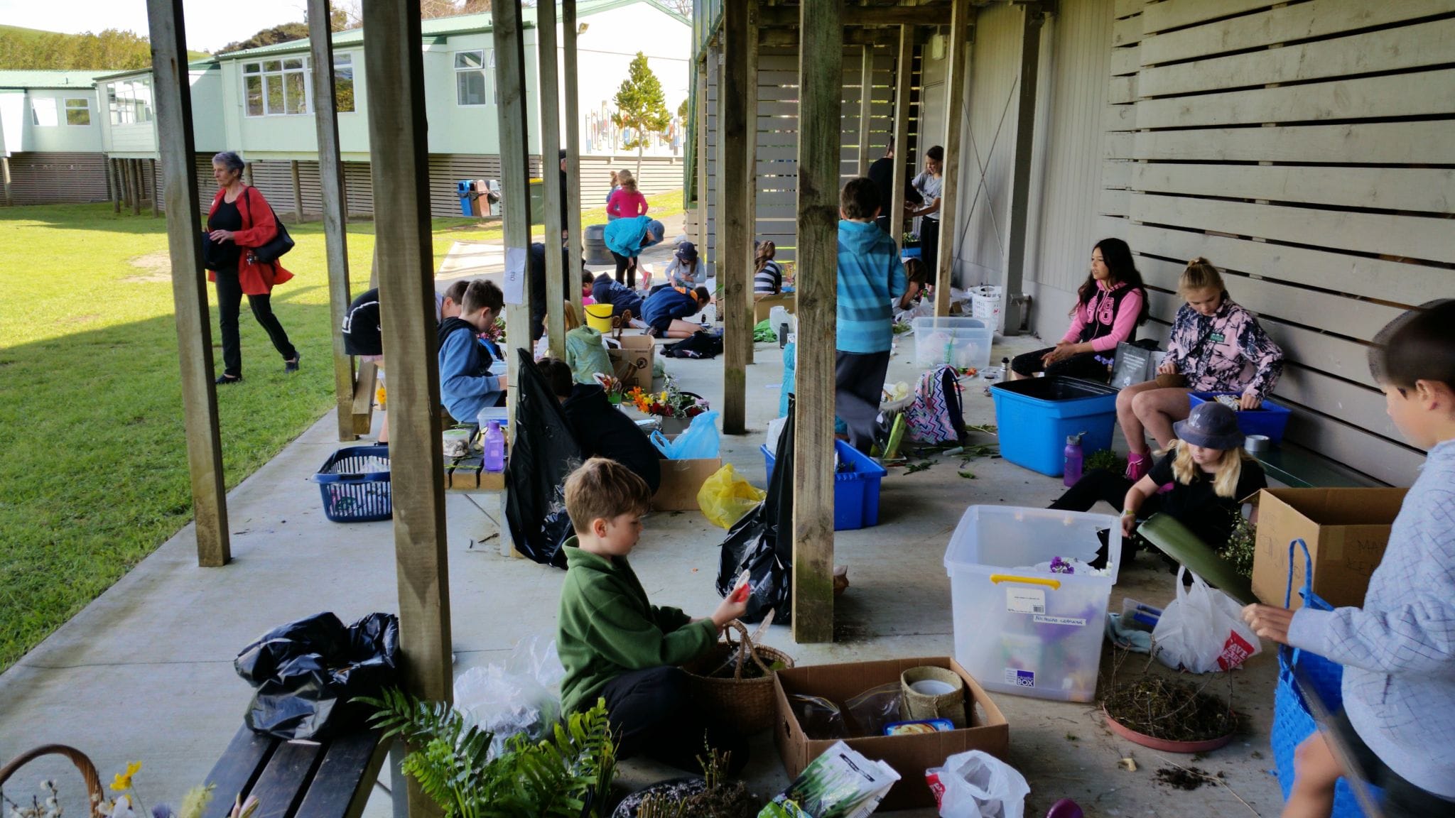 The kids all busy mnaking art pieces, floral decorations, miniature gardens etc.