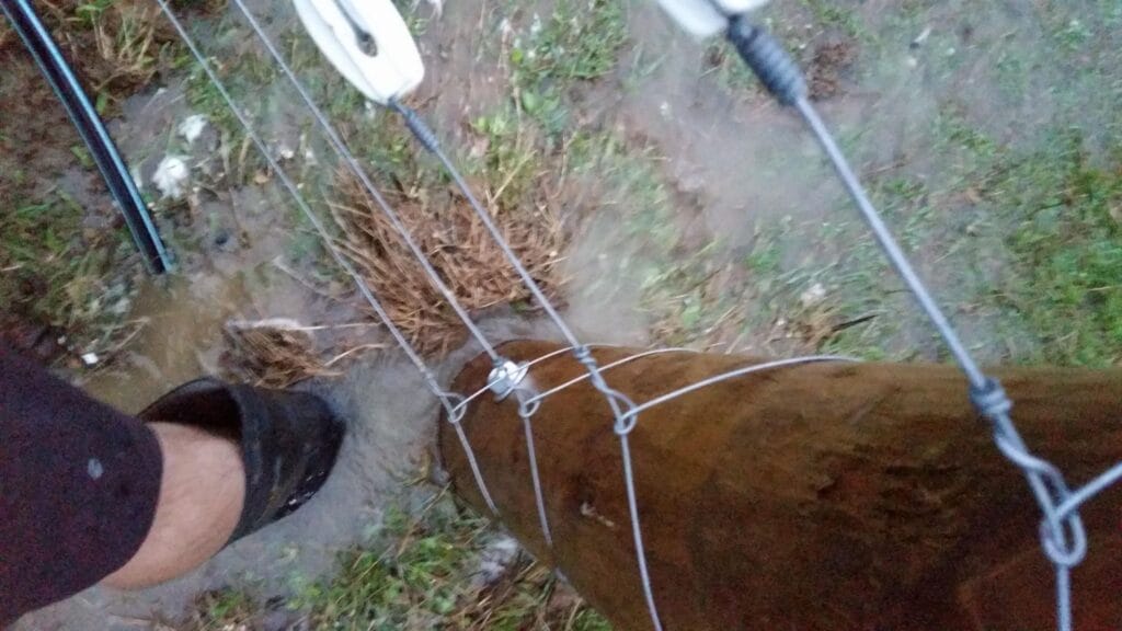 Amazing to see how much water comes out of a 100mm dia storm water main - the hole fits my whole gumboot
