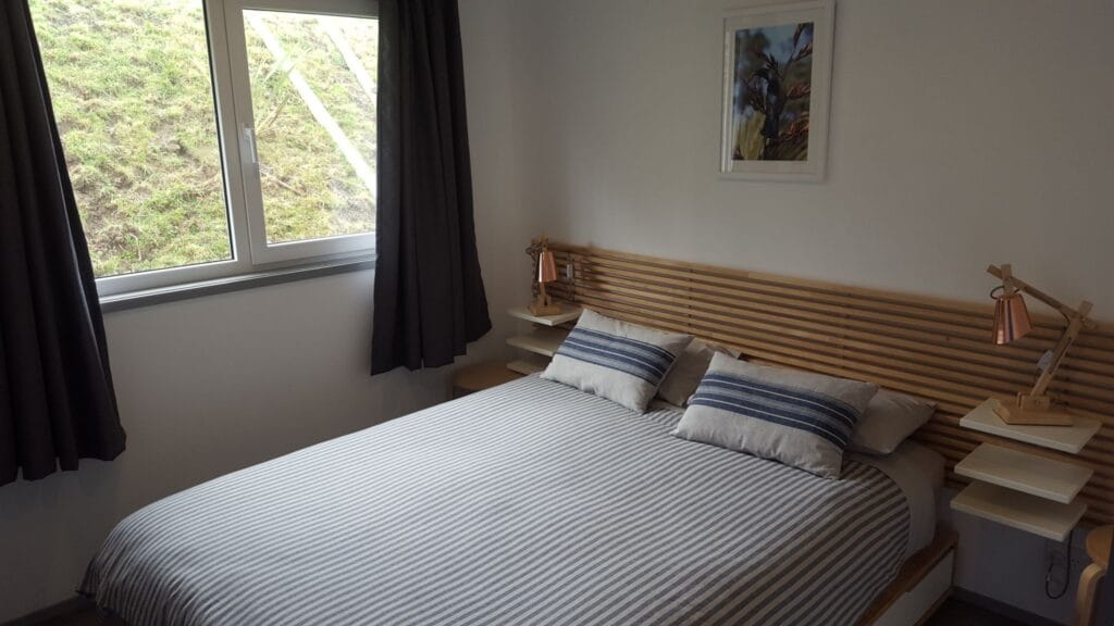 bedroom with comfy IKEA queen bed