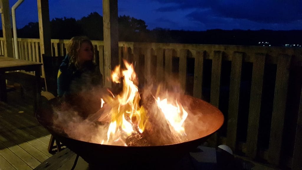 Fire burning in a metal bowl
