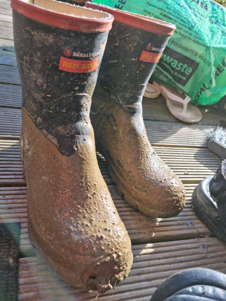 Muddy gumboots