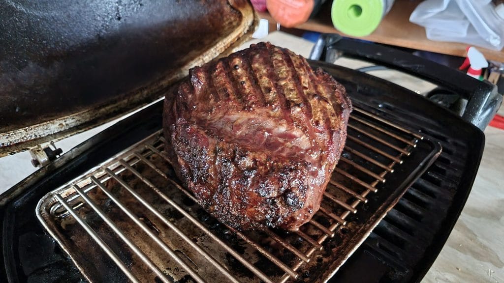 A beef roast on a BBQ