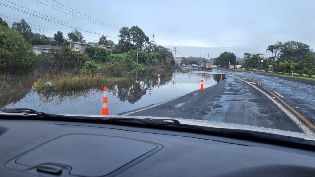 Flooded road with one on of the two lanes available